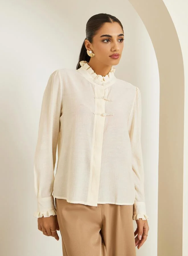 ستايلي قميص بأكمام طويلة